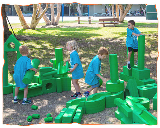 green blocks with children