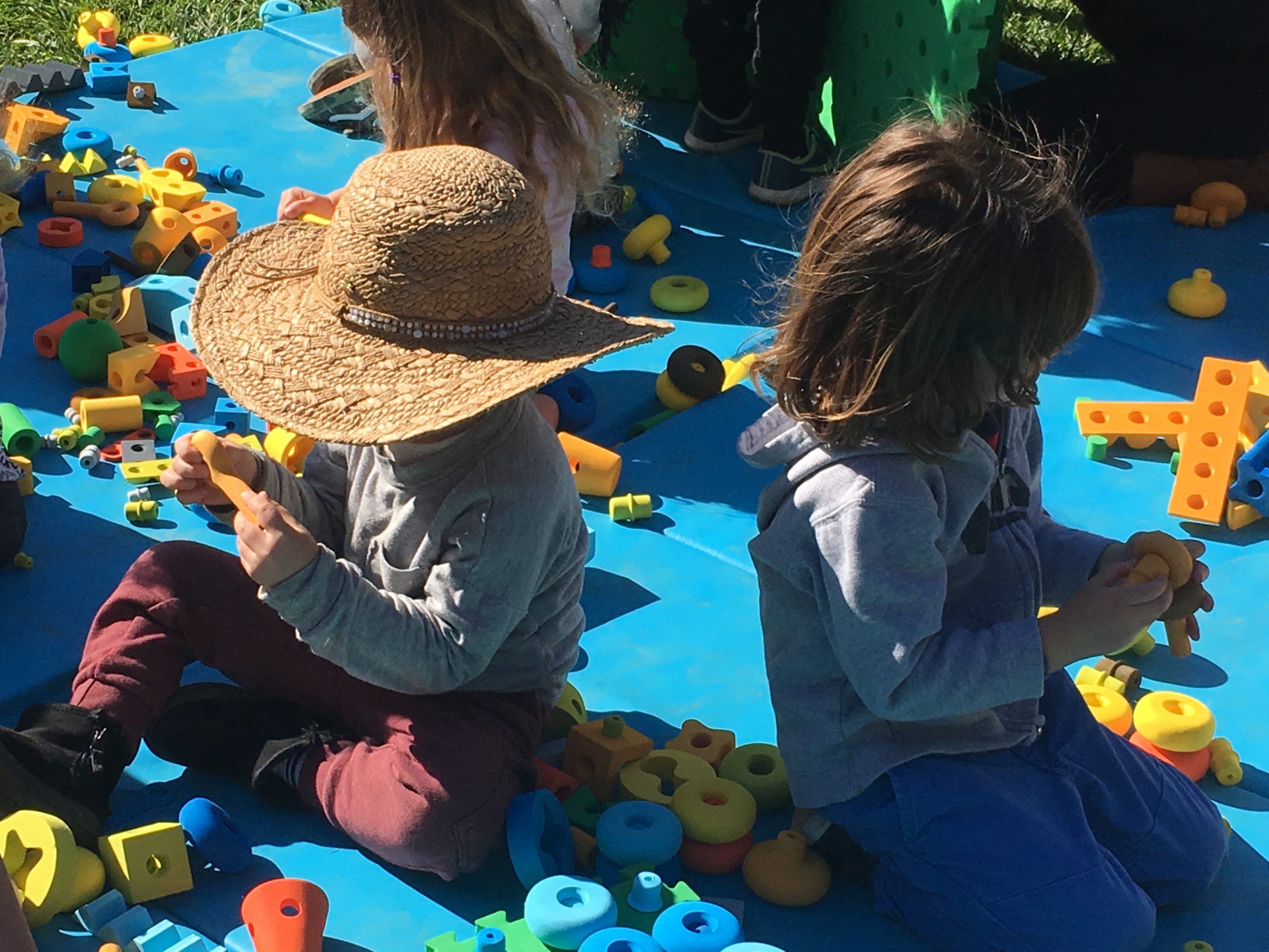 Children playing with Bright Day Big Blocks